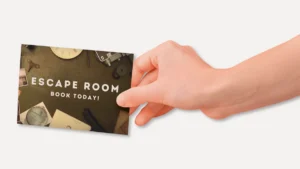 Escape room marketing materials featuring interactive printed puzzles, scratch-off elements, and specialty printing techniques.